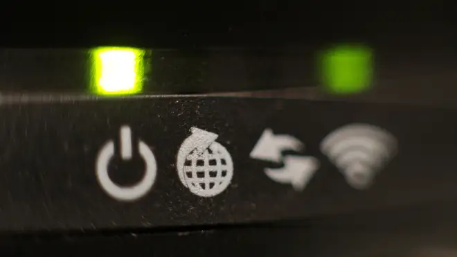 The lights on the front panel of a broadband internet router